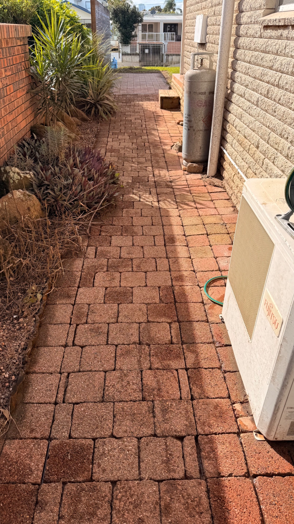 Brick paver side path after